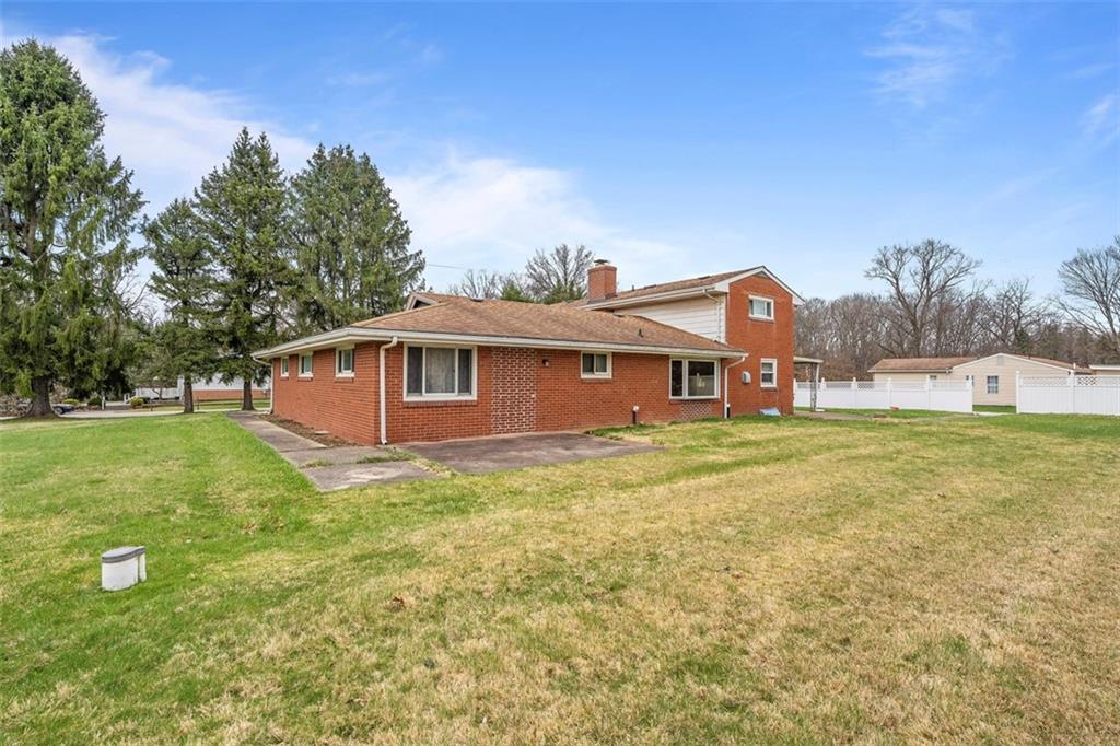 391 Golden Grove Road Baden, PA 15005 - Photo 5 of 34 a front view of a house with garden