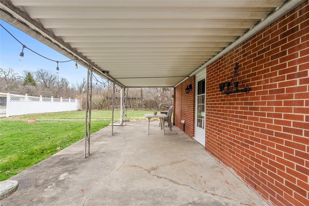 391 Golden Grove Road Baden, PA 15005 - Photo 7 of 34 a view of a porch with garden
