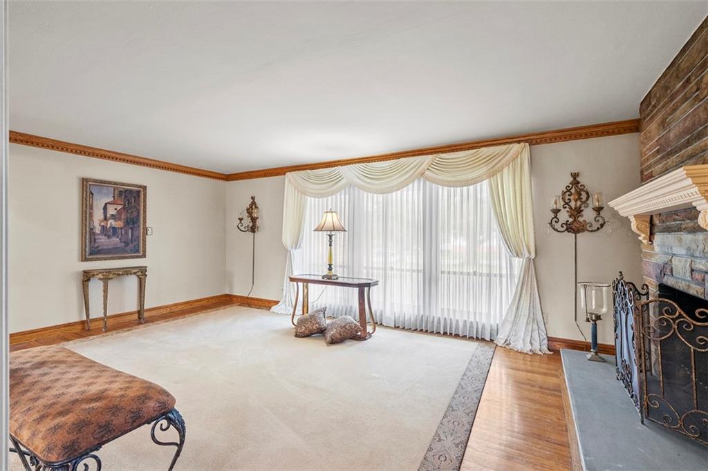 391 Golden Grove Road Baden, PA 15005 - Photo 9 of 34 a bedroom with a bed and a painting on the wall