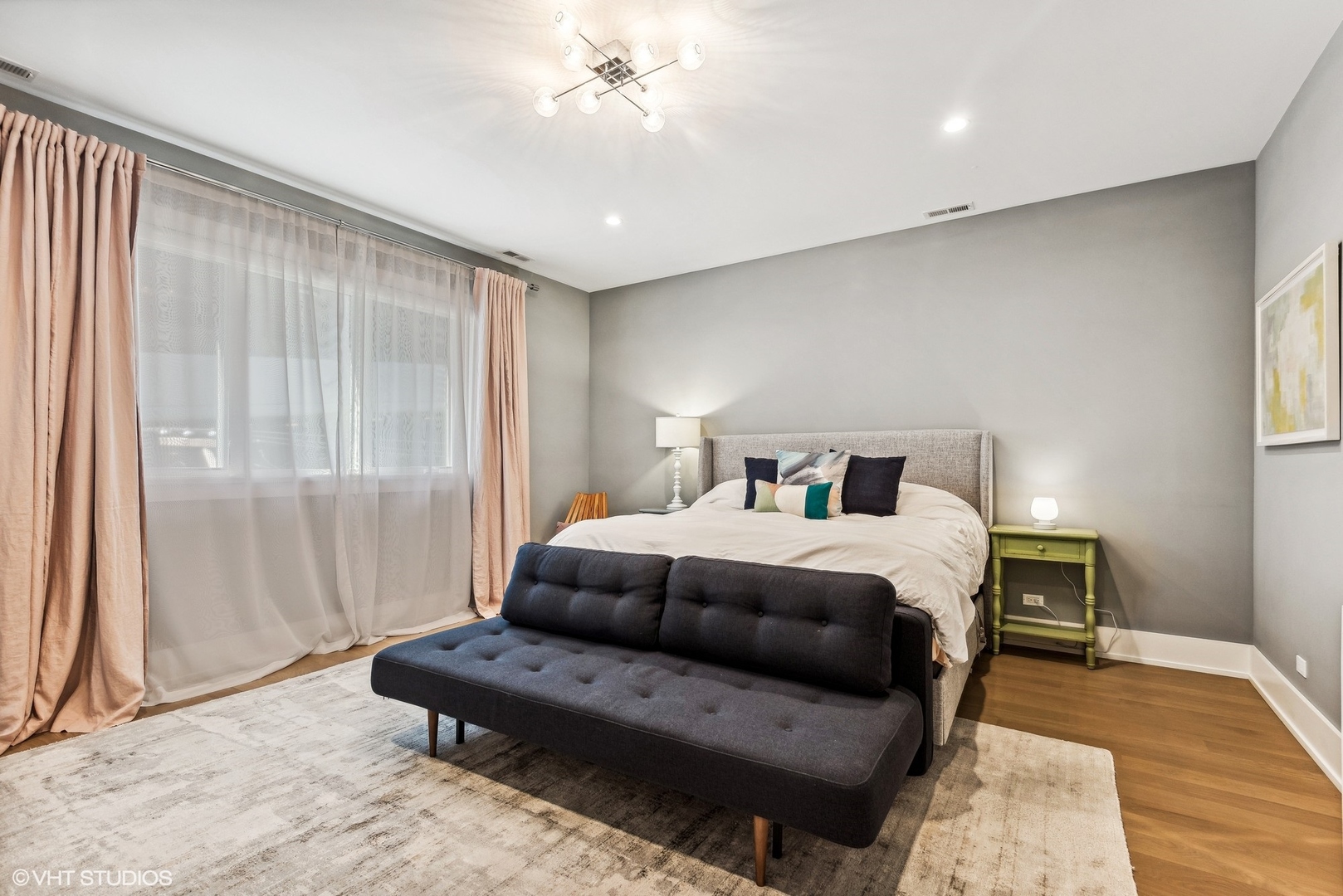 220 South Green Street, Unit 3N Chicago, IL 60607 - Photo 16 of 34 a bedroom with furniture and a large window