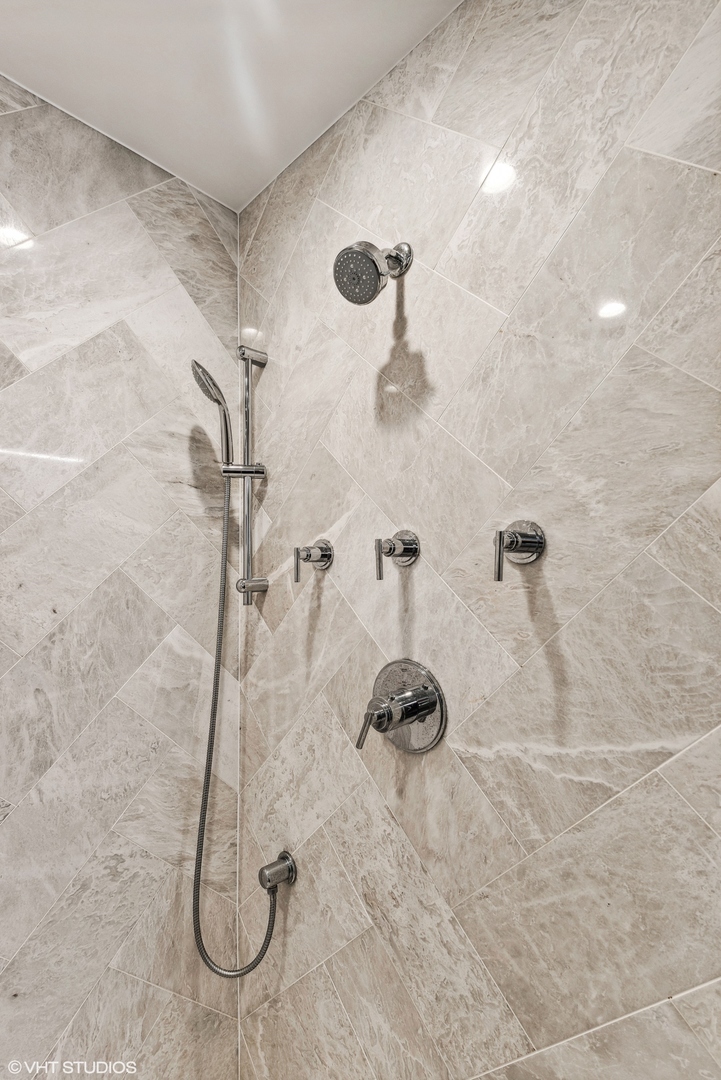 220 South Green Street, Unit 3N Chicago, IL 60607 - Photo 23 of 34 a bathroom with a shower