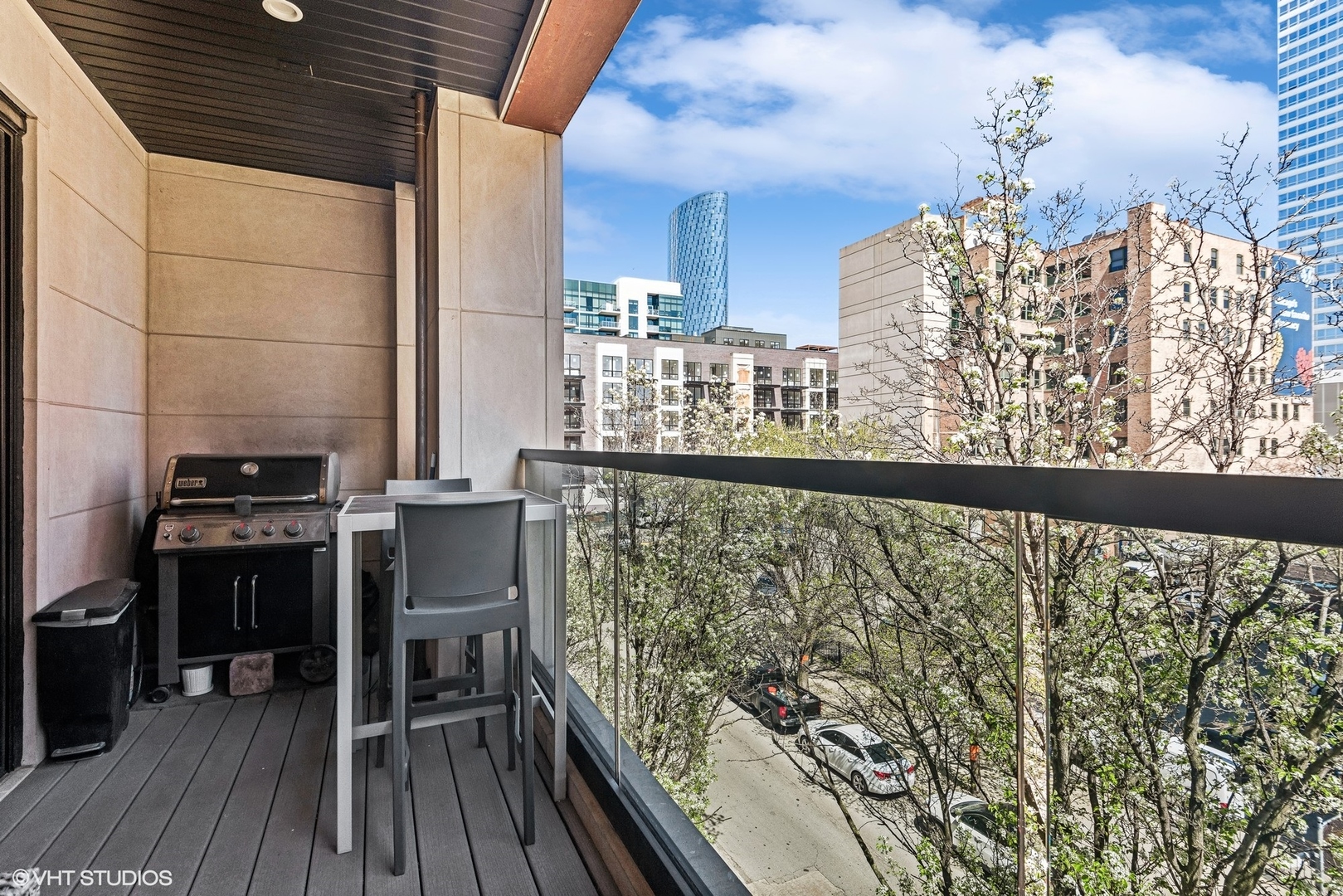 220 South Green Street, Unit 3N Chicago, IL 60607 - Photo 31 of 34 a view of a chairs and table in a balcony