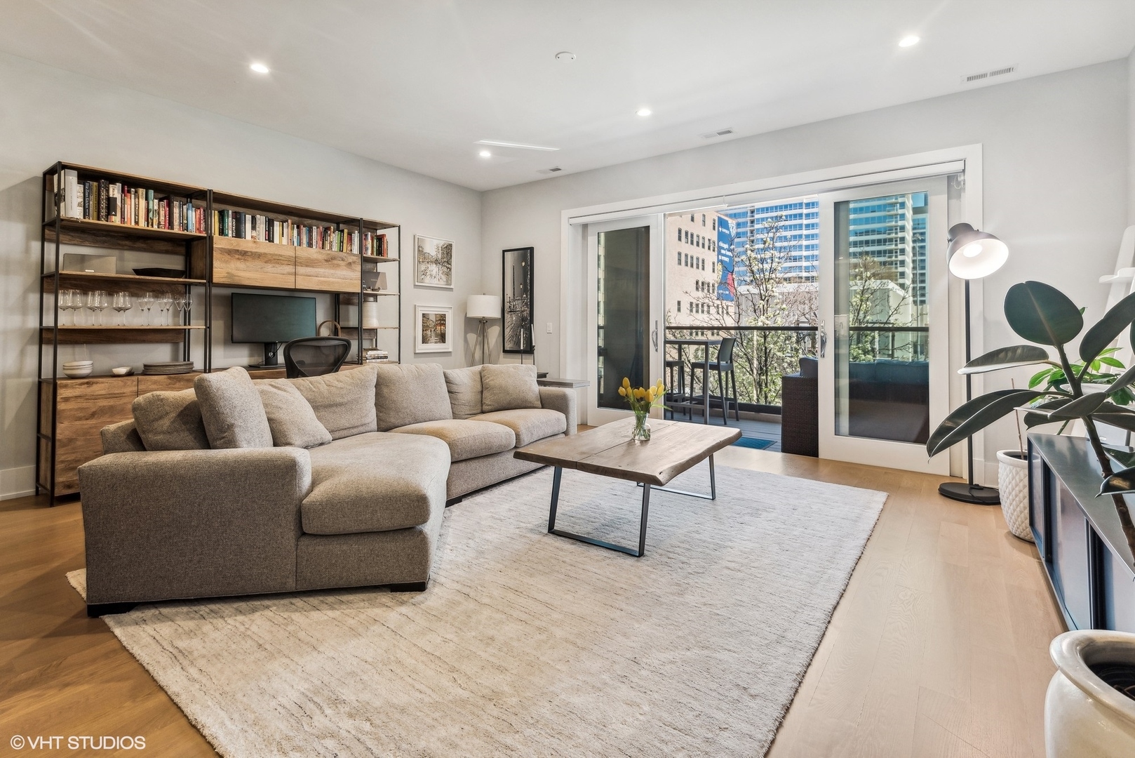220 South Green Street, Unit 3N Chicago, IL 60607 - Photo 4 of 34 a living room with furniture and a floor to ceiling window