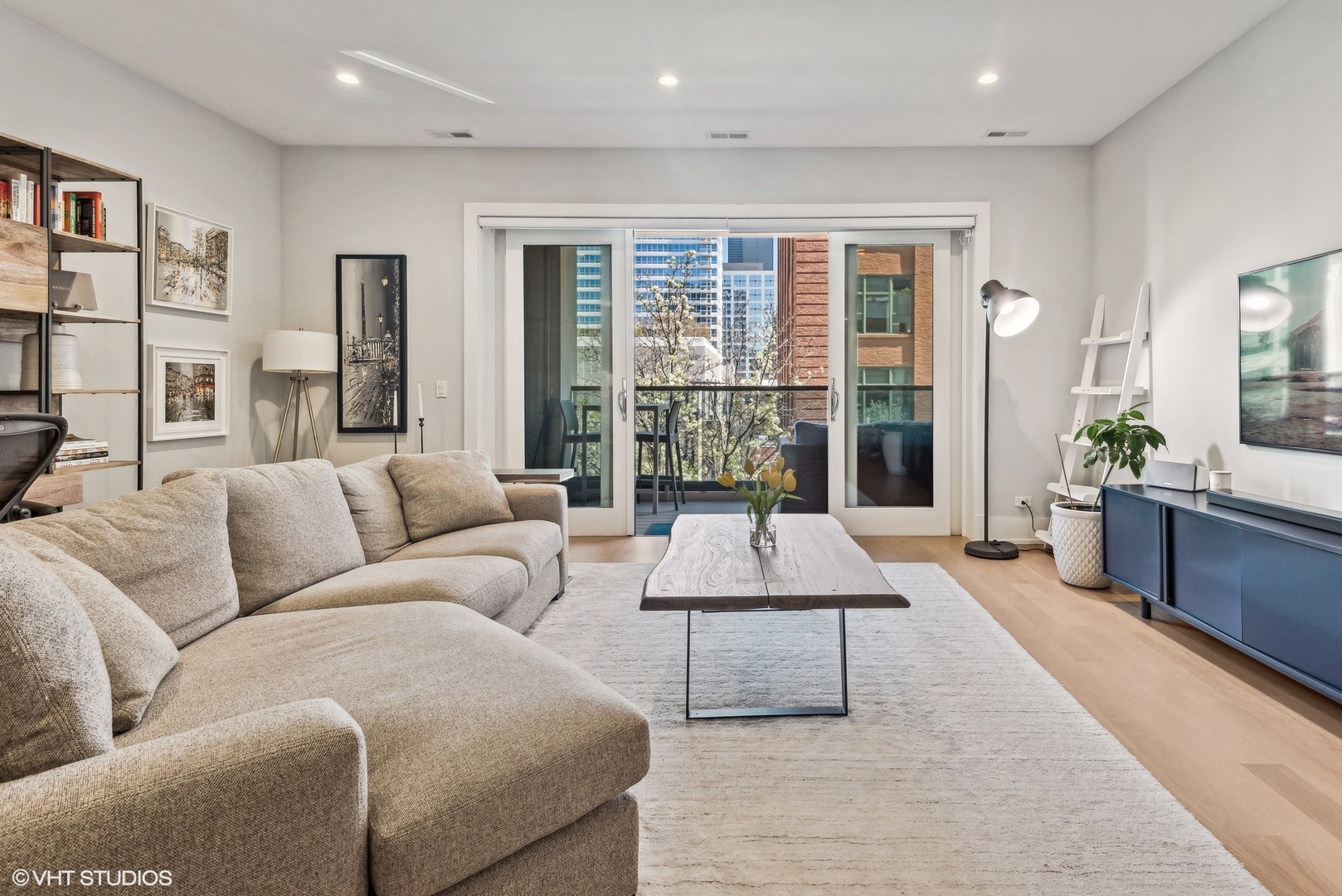 220 South Green Street, Unit 3N Chicago, IL 60607 - Photo 5 of 34 a living room with furniture and large windows