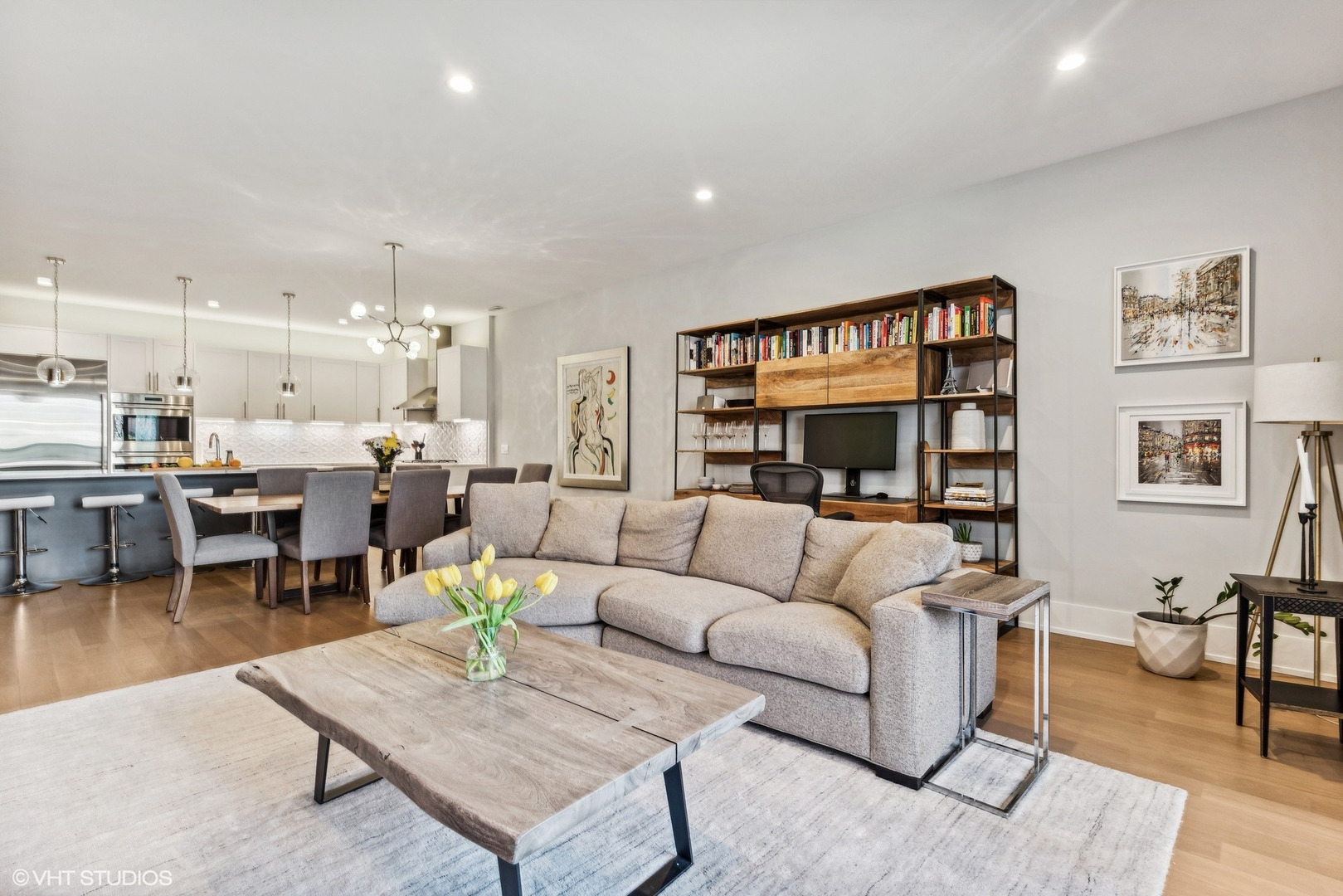 220 South Green Street, Unit 3N Chicago, IL 60607 - Photo 6 of 34 a living room with furniture and a table