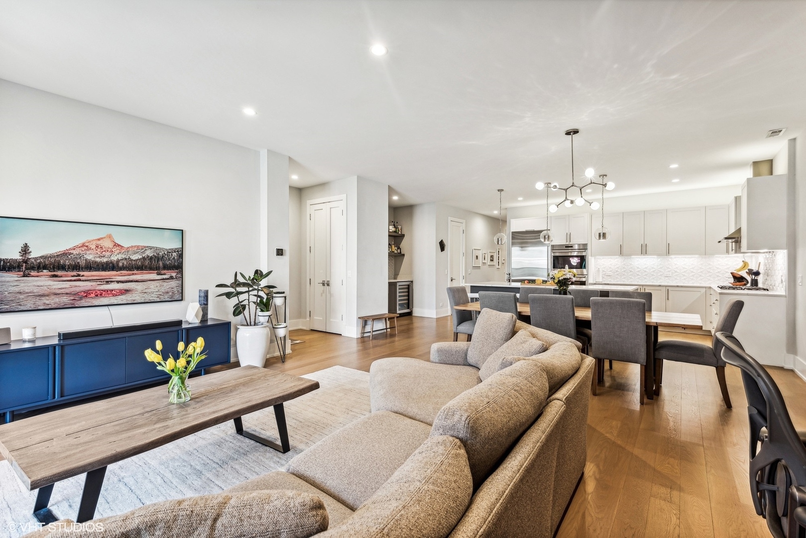 220 South Green Street, Unit 3N Chicago, IL 60607 - Photo 7 of 34 a living room with furniture kitchen view and a dining table