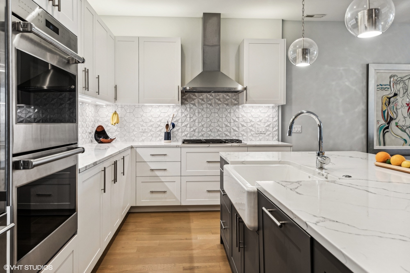 220 South Green Street, Unit 3N Chicago, IL 60607 - Photo 9 of 34 a kitchen with stainless steel appliances a sink stove and cabinets