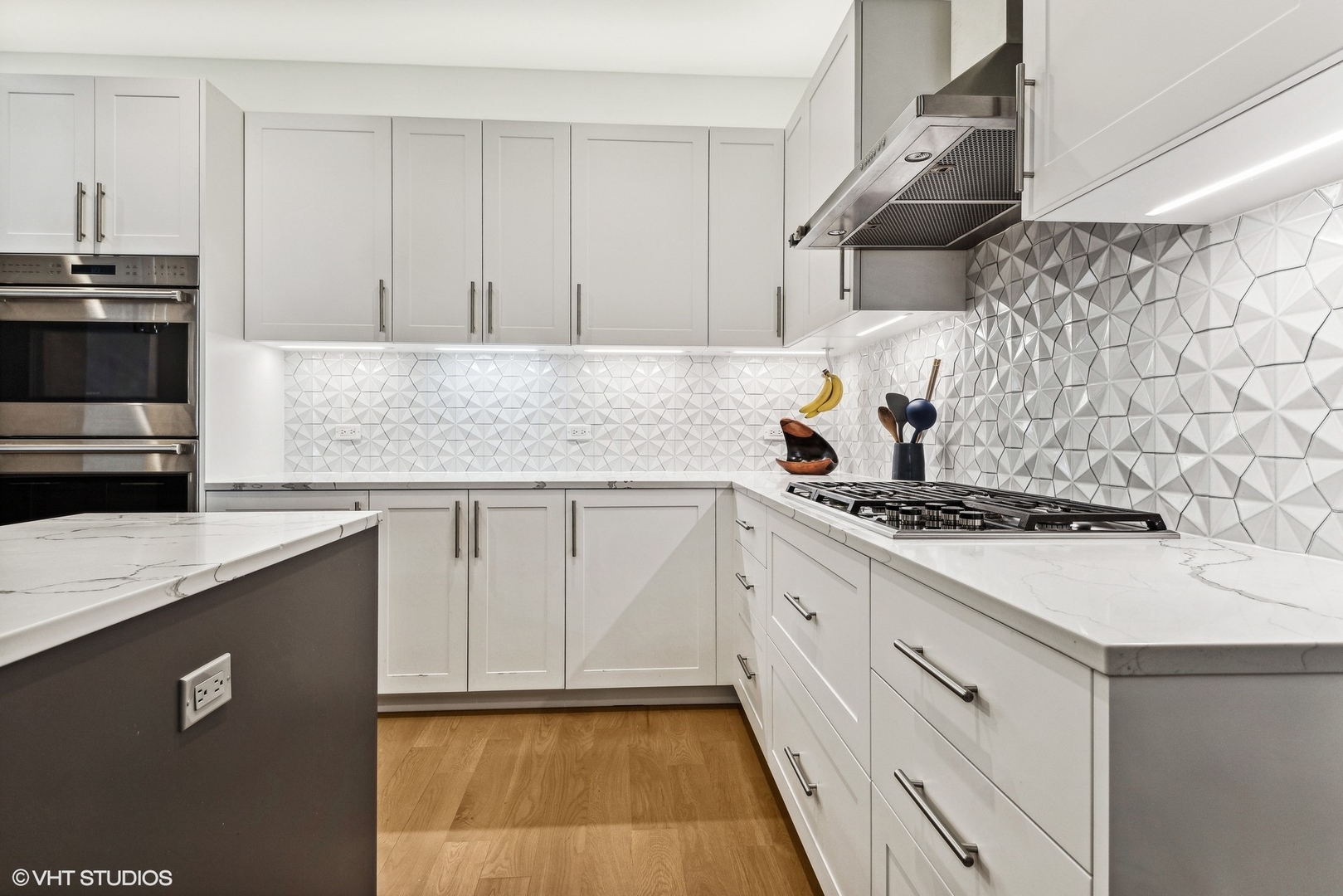 220 South Green Street, Unit 3N Chicago, IL 60607 - Photo 10 of 34 a kitchen with granite countertop a sink stove and cabinets