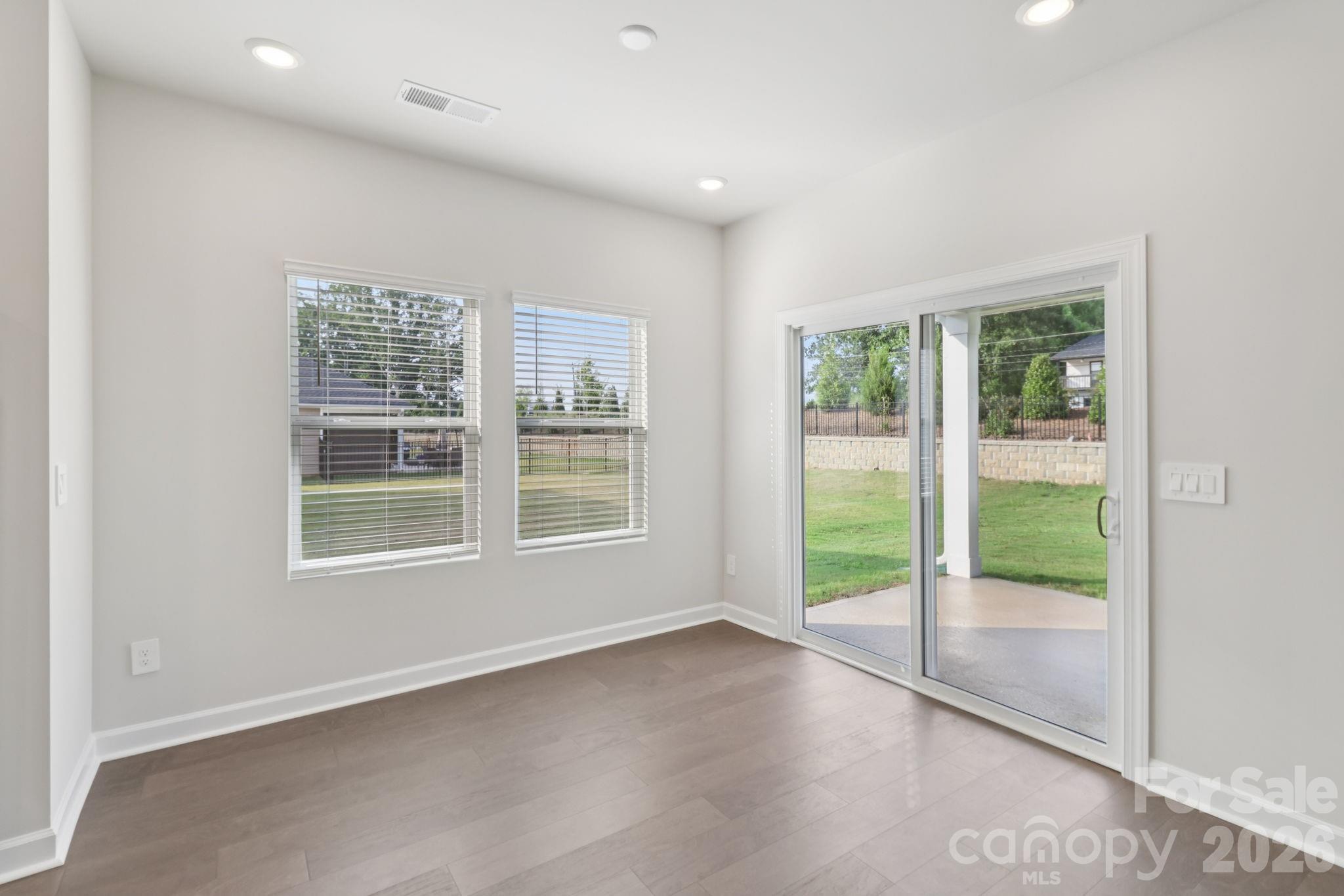 2449 Chartwell Street Stanley, NC 28164 - Photo 11 of 23 an empty room with windows