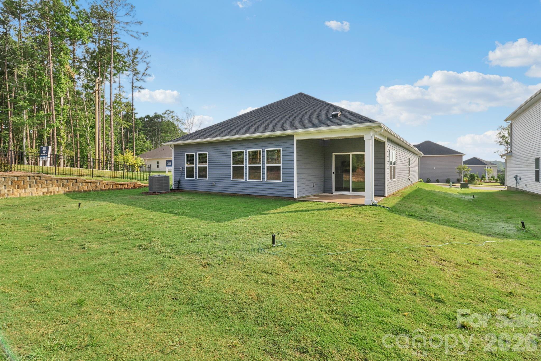 2449 Chartwell Street Stanley, NC 28164 - Photo 23 of 23 a house view with a garden space
