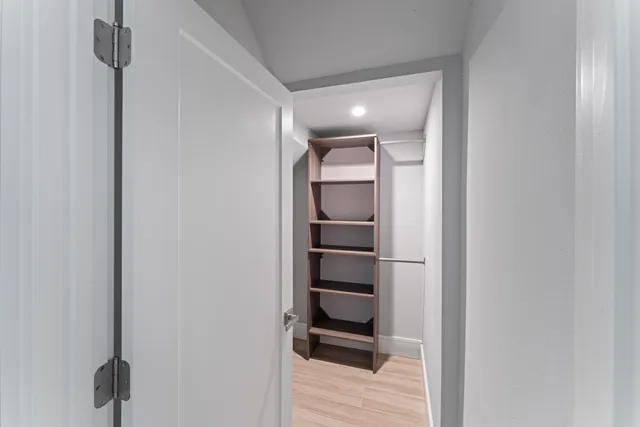a kitchen with stainless steel appliances a sink stove and refrigerator