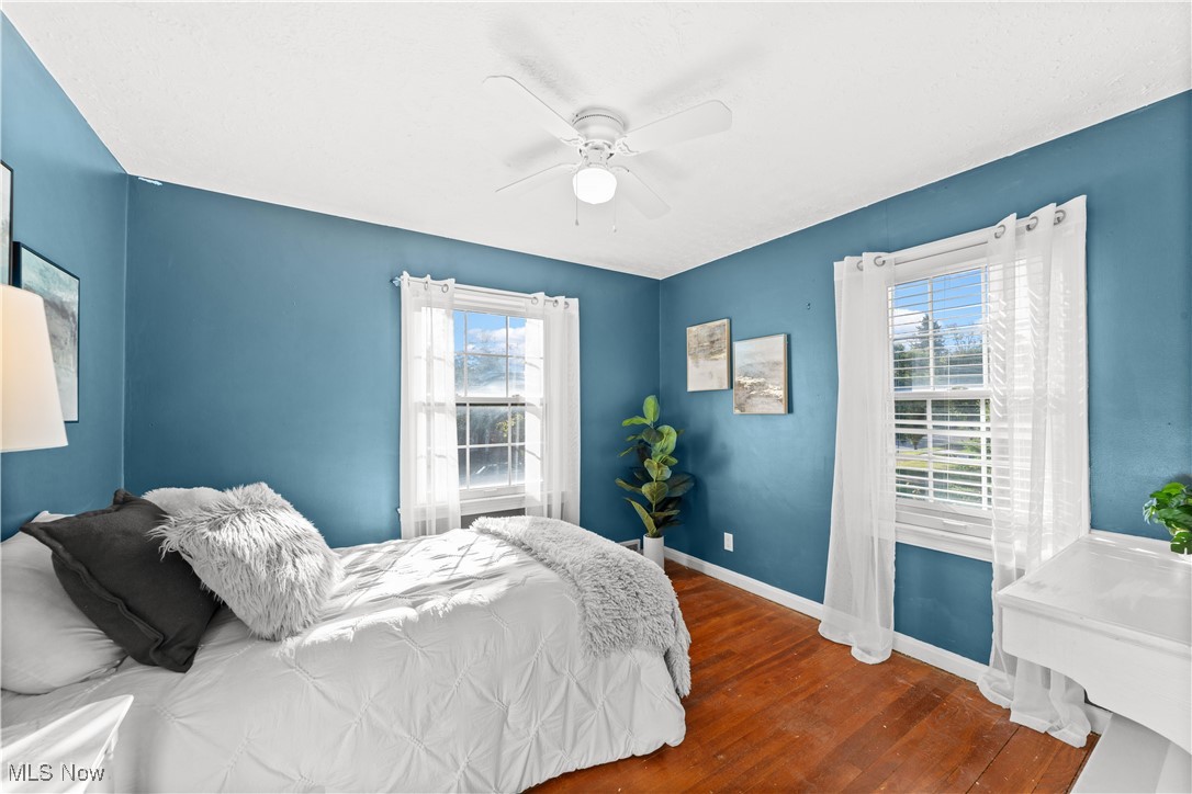3690 Daleford Road Cleveland, OH 44120 - Photo 22 of 45 Bedroom featuring hardwood / wood-style floors and a ceiling fan