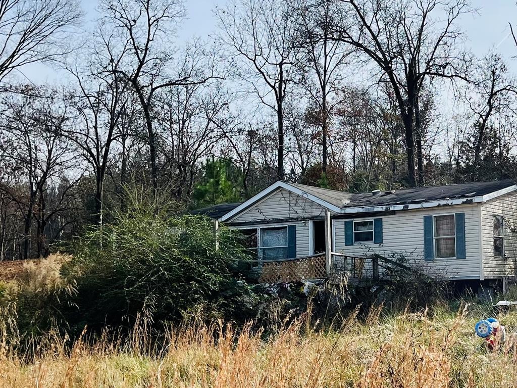 1865 Liggett Road Decatur, TN 37322 - Photo 5 of 9 a front view of a house with a yard