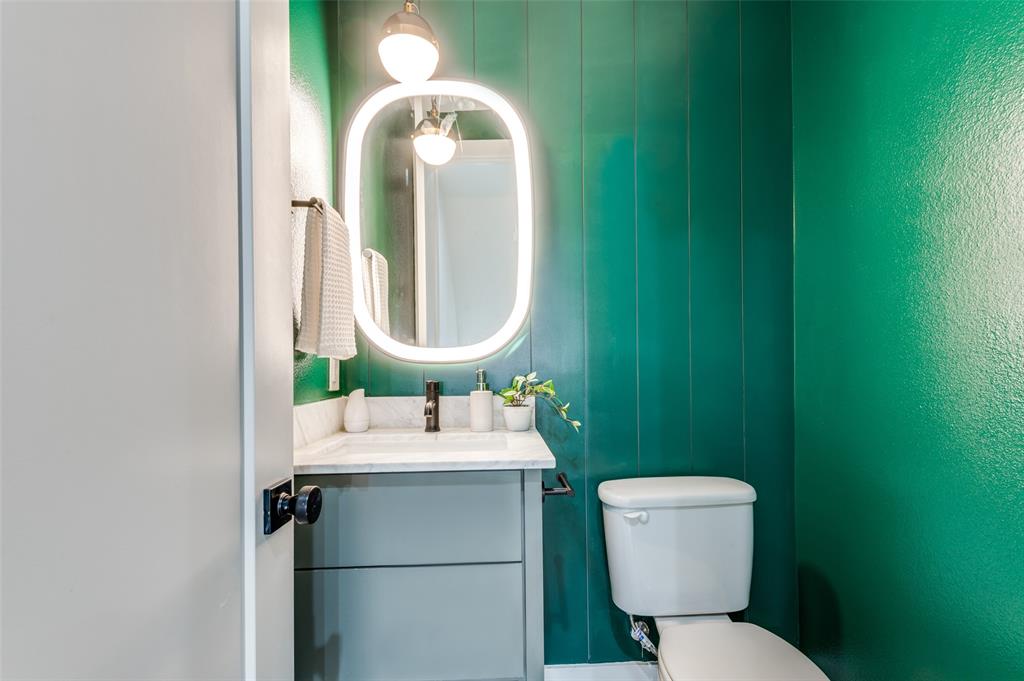 1147 North Madison Avenue, Unit 102 Dallas, TX 75208 - Photo 8 of 24 Moody half bathroom on the second level.