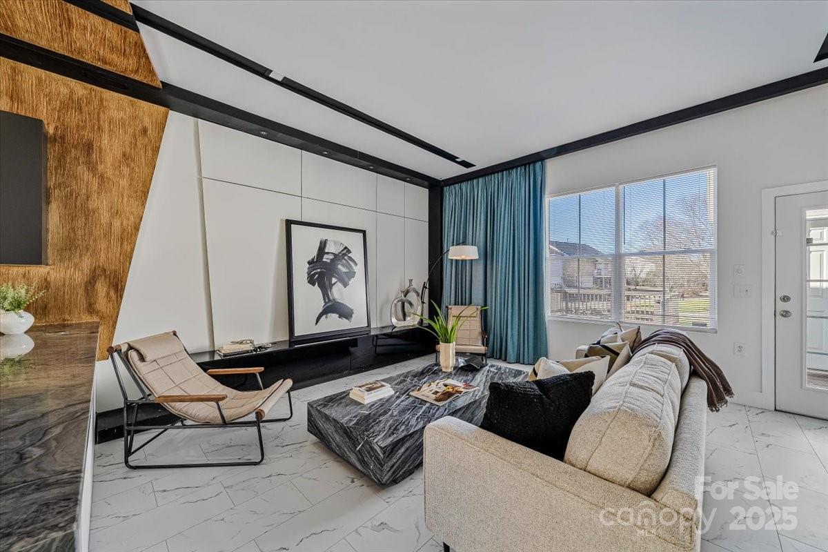 6517 Old Magnolia Lane Mint Hill, NC 28227 - Photo 14 of 46 a living room with furniture and large windows