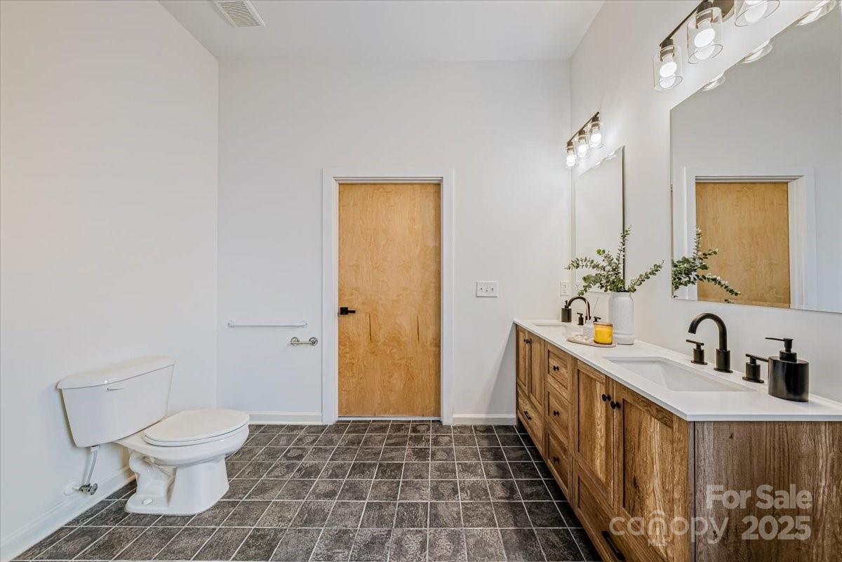 6517 Old Magnolia Lane Mint Hill, NC 28227 - Photo 26 of 46 a bathroom with a sink toilet and shower