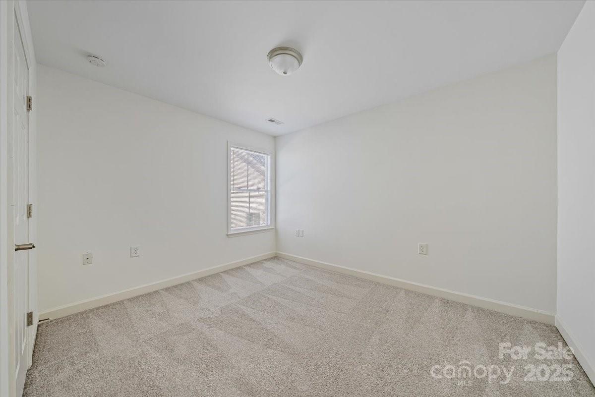 6517 Old Magnolia Lane Mint Hill, NC 28227 - Photo 29 of 46 a view of an empty room with a window