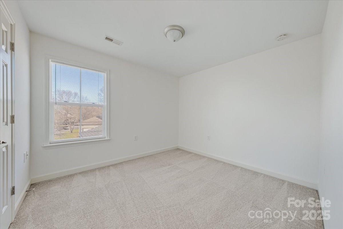 6517 Old Magnolia Lane Mint Hill, NC 28227 - Photo 34 of 46 an empty room with a window
