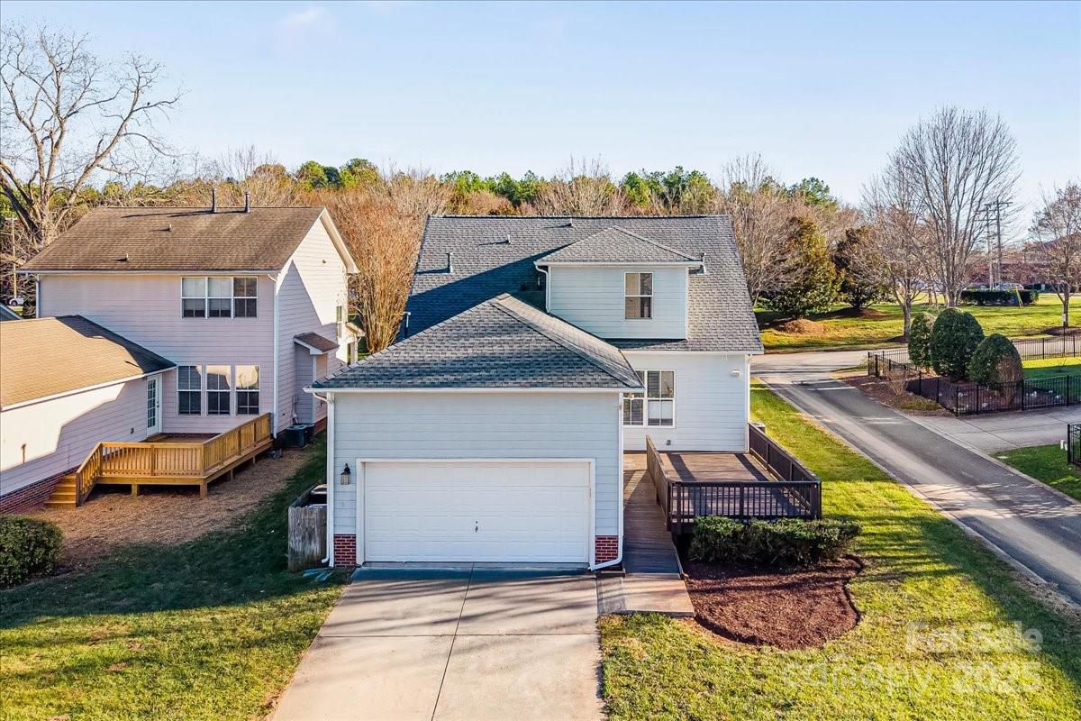 6517 Old Magnolia Lane Mint Hill, NC 28227 - Photo 38 of 46 a aerial view of a house with swimming pool and furniture