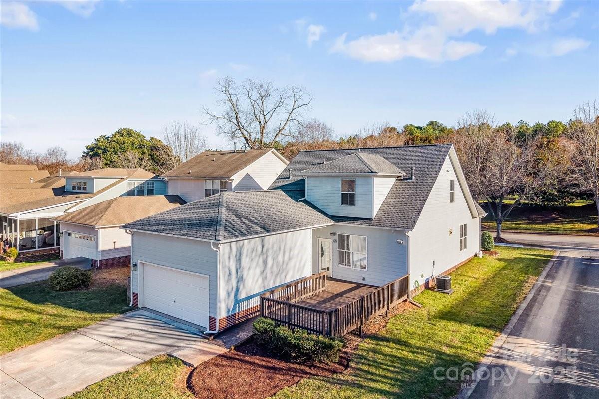 6517 Old Magnolia Lane Mint Hill, NC 28227 - Photo 39 of 46 a view of a house with backyard and sitting area