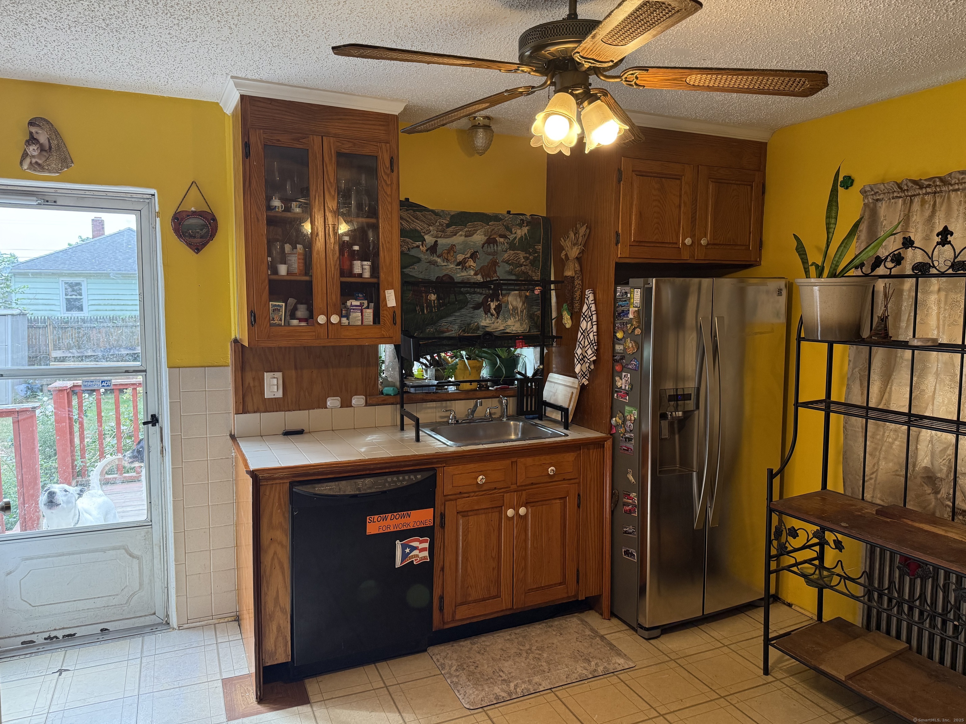 181 City View Avenue Bridgeport, CT 06606 - Photo 12 of 33 a kitchen with stainless steel appliances granite countertop a stove a sink and a refrigerator