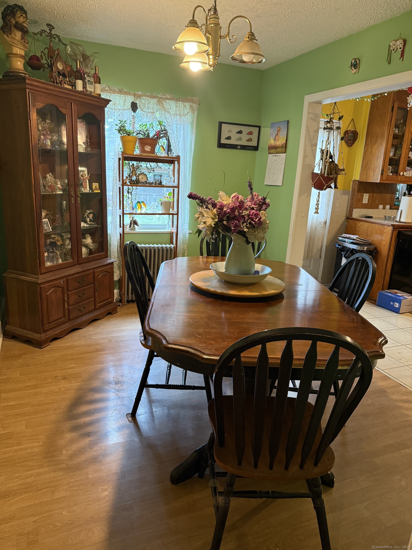 181 City View Avenue Bridgeport, CT 06606 - Photo 16 of 33 a view of a dining room with furniture and wooden floor