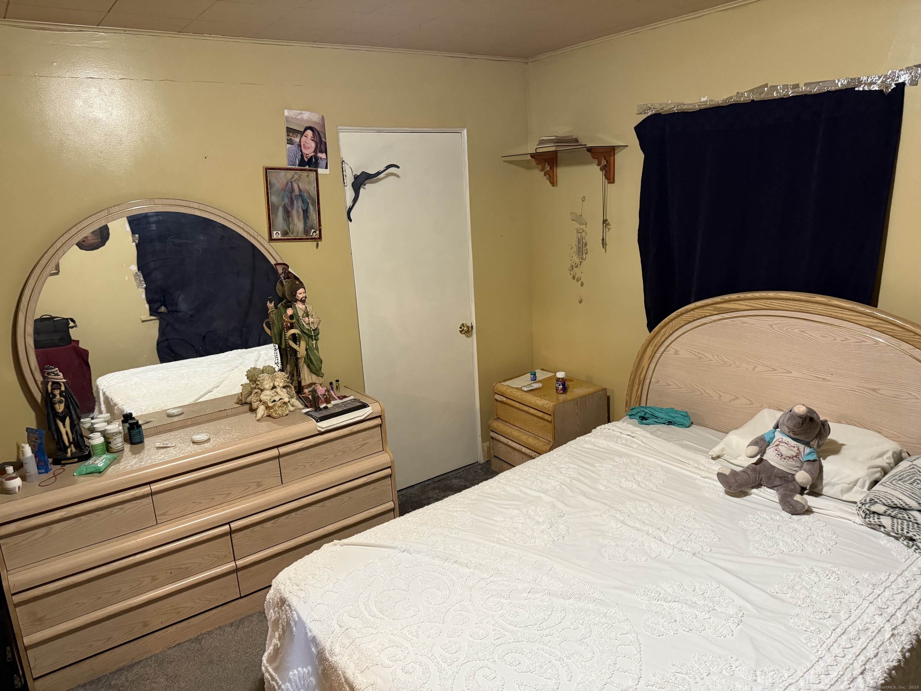 181 City View Avenue Bridgeport, CT 06606 - Photo 24 of 33 a bedroom with bed and wooden floor