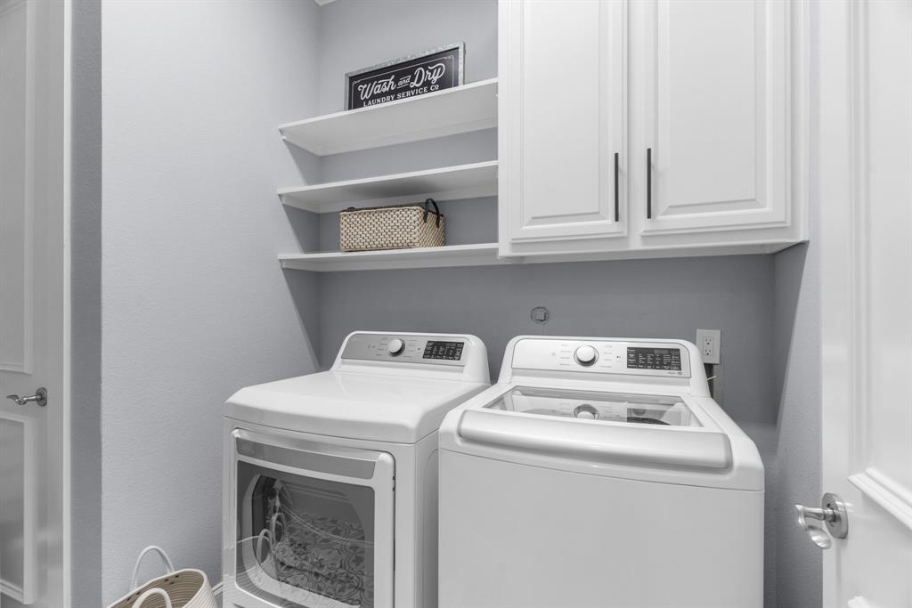 2222 Worthington Street Dallas, TX 75204 - Photo 15 of 39 a utility room with dryer and washer
