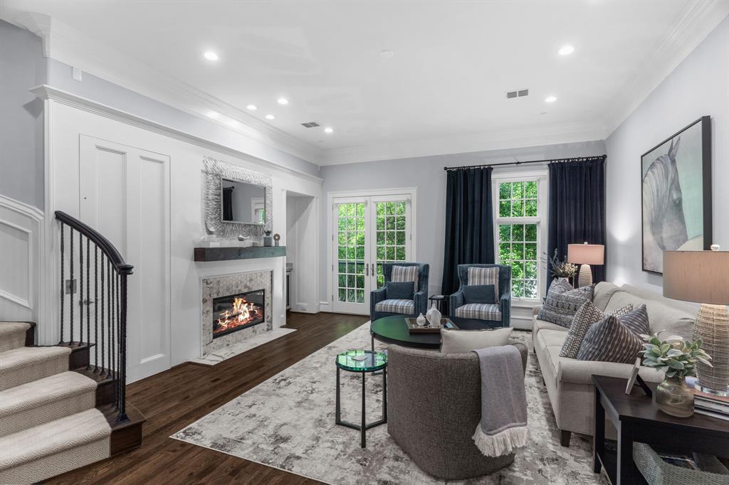 2222 Worthington Street Dallas, TX 75204 - Photo 17 of 39 a living room with furniture fireplace and flat screen tv