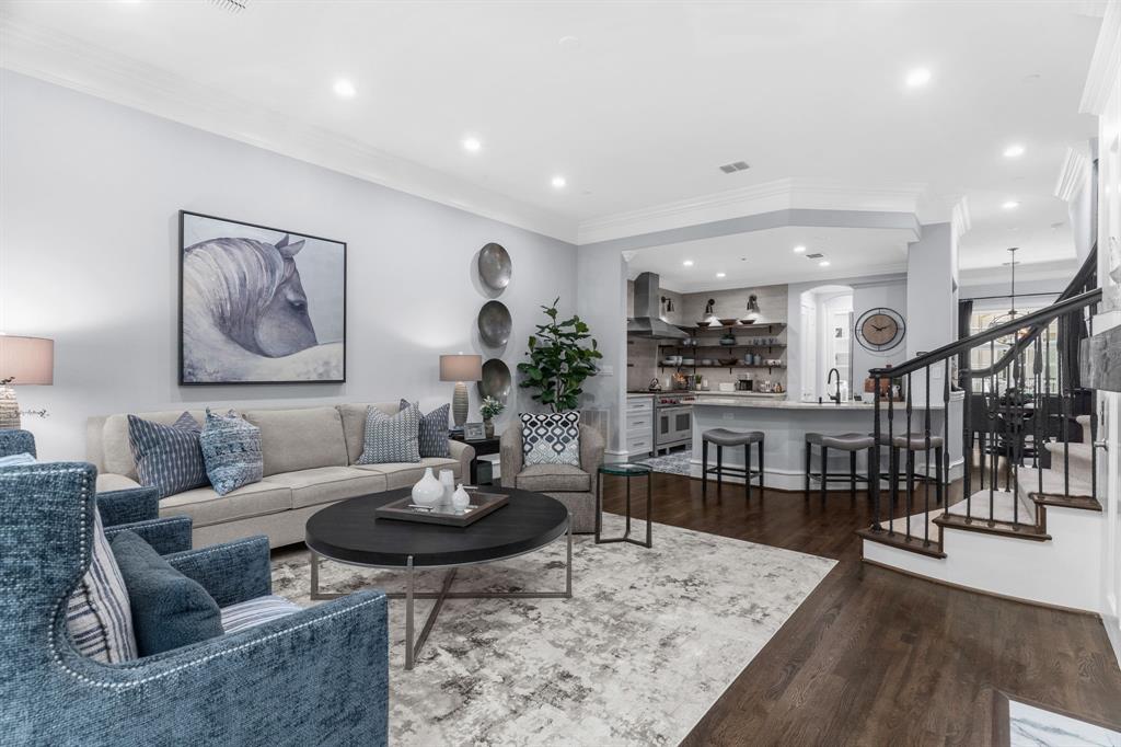 2222 Worthington Street Dallas, TX 75204 - Photo 18 of 39 a living room with furniture and view of kitchen