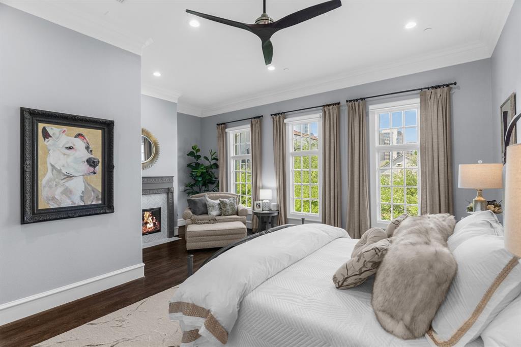 2222 Worthington Street Dallas, TX 75204 - Photo 23 of 39 a bedroom with a large bed couch and a window