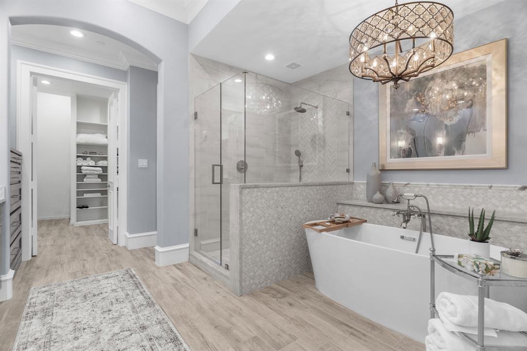 2222 Worthington Street Dallas, TX 75204 - Photo 27 of 39 a bathroom with a sink and a mirror