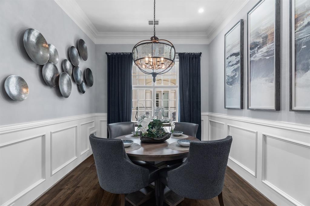 2222 Worthington Street Dallas, TX 75204 - Photo 8 of 39 a view of a dining room with furniture window and wooden floor