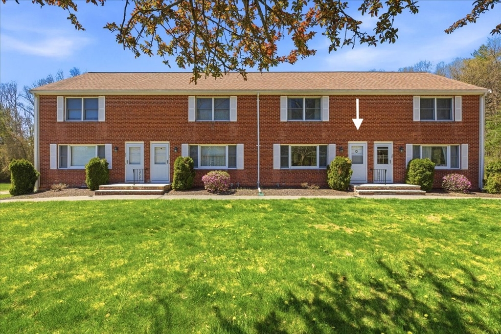 46 Willow Ridge Drive, Unit 46 Bridgewater, MA 02324 - Photo 1 of 40 a front view of a house with a yard