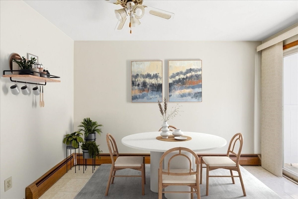 46 Willow Ridge Drive, Unit 46 Bridgewater, MA 02324 - Photo 15 of 40 a dining room with furniture and window