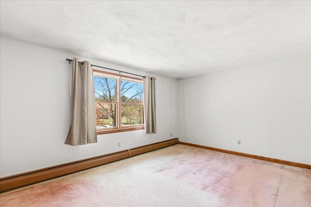46 Willow Ridge Drive, Unit 46 Bridgewater, MA 02324 - Photo 24 of 40 an empty room with windows