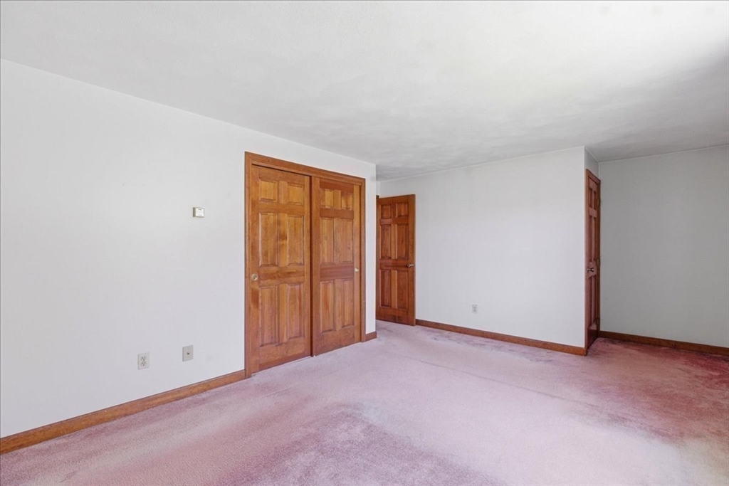 46 Willow Ridge Drive, Unit 46 Bridgewater, MA 02324 - Photo 25 of 40 an empty room with closet area