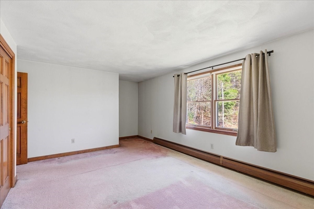 46 Willow Ridge Drive, Unit 46 Bridgewater, MA 02324 - Photo 26 of 40 an empty room with windows