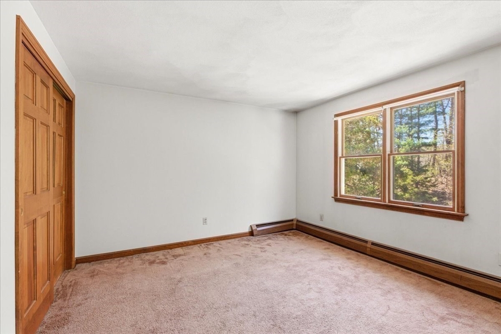 46 Willow Ridge Drive, Unit 46 Bridgewater, MA 02324 - Photo 27 of 40 an empty room with a window
