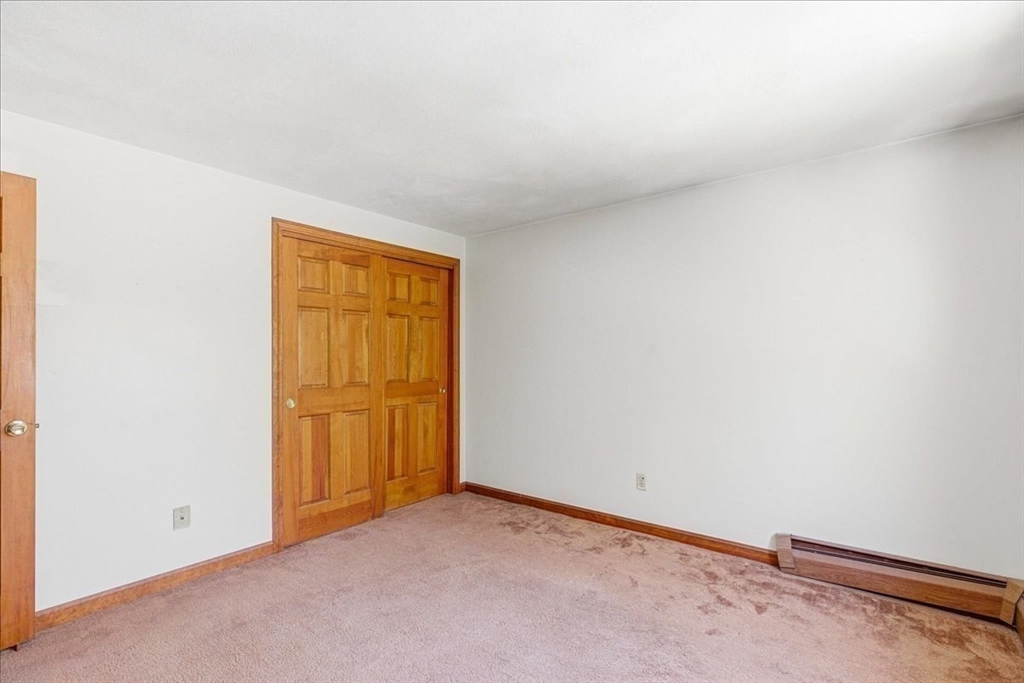 46 Willow Ridge Drive, Unit 46 Bridgewater, MA 02324 - Photo 29 of 40 an empty room with closet