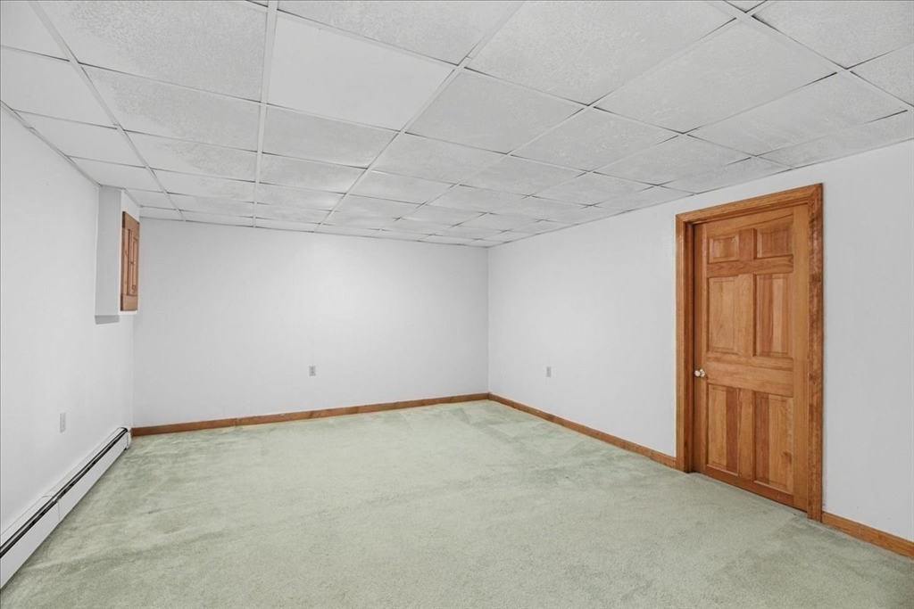 46 Willow Ridge Drive, Unit 46 Bridgewater, MA 02324 - Photo 32 of 40 an empty room with windows