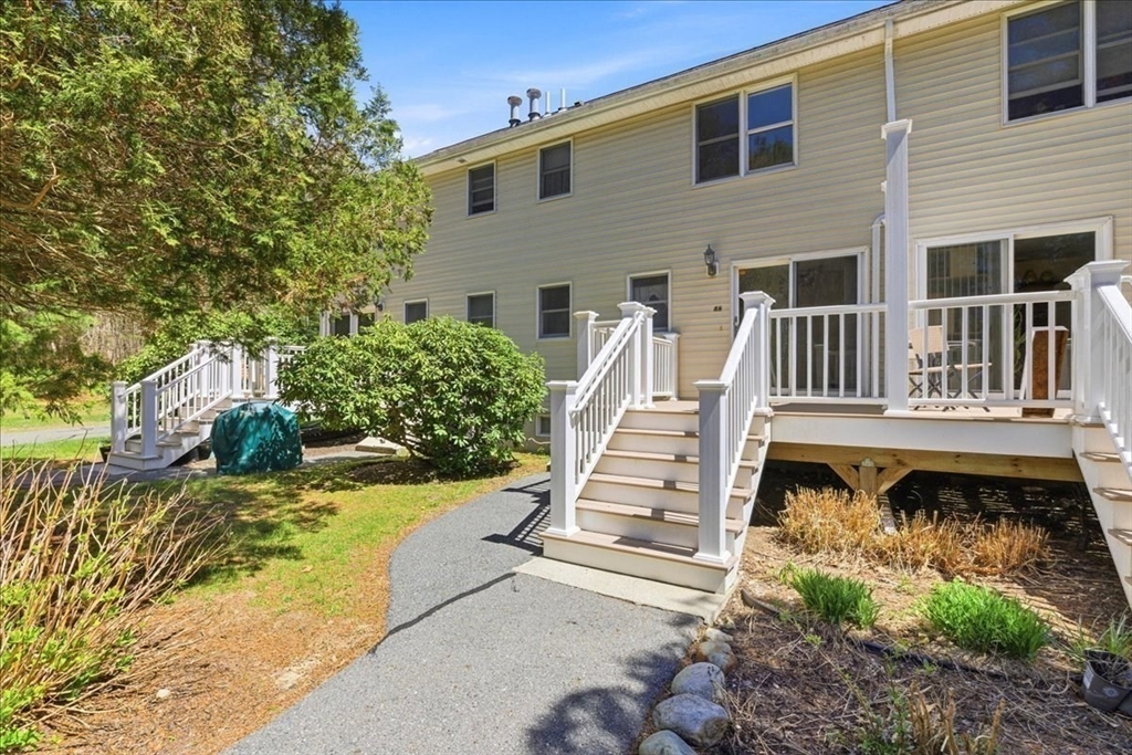 46 Willow Ridge Drive, Unit 46 Bridgewater, MA 02324 - Photo 39 of 40 a front view of a house with a yard