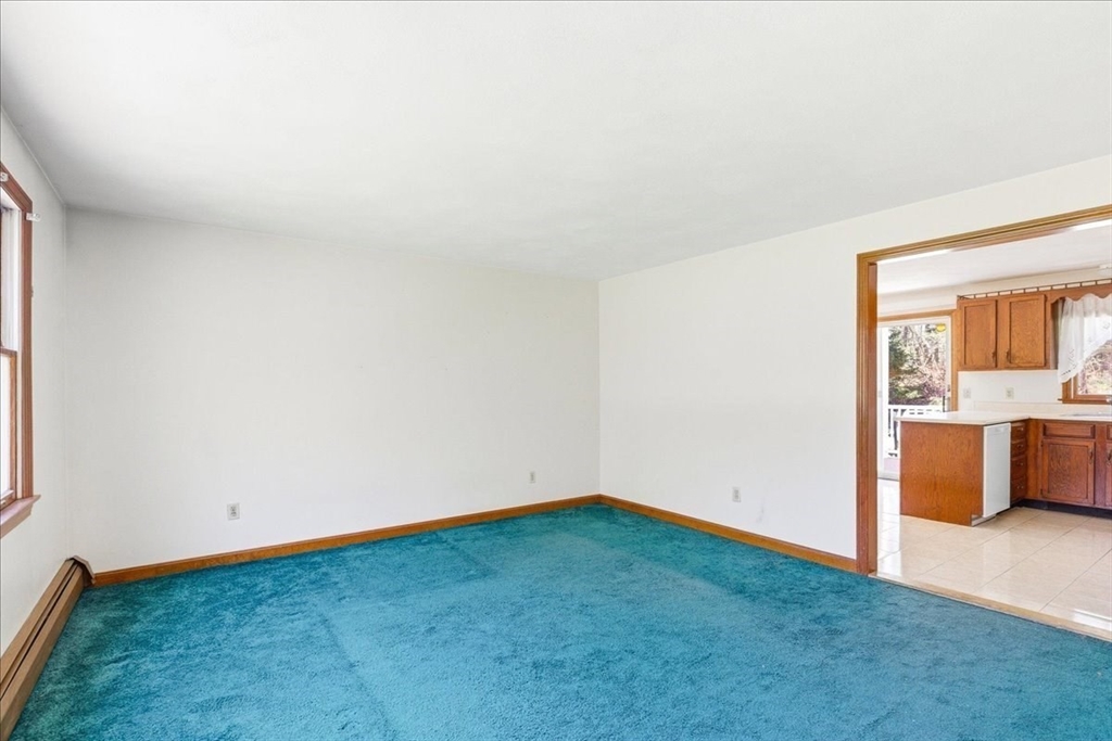 46 Willow Ridge Drive, Unit 46 Bridgewater, MA 02324 - Photo 5 of 40 an empty room with a window