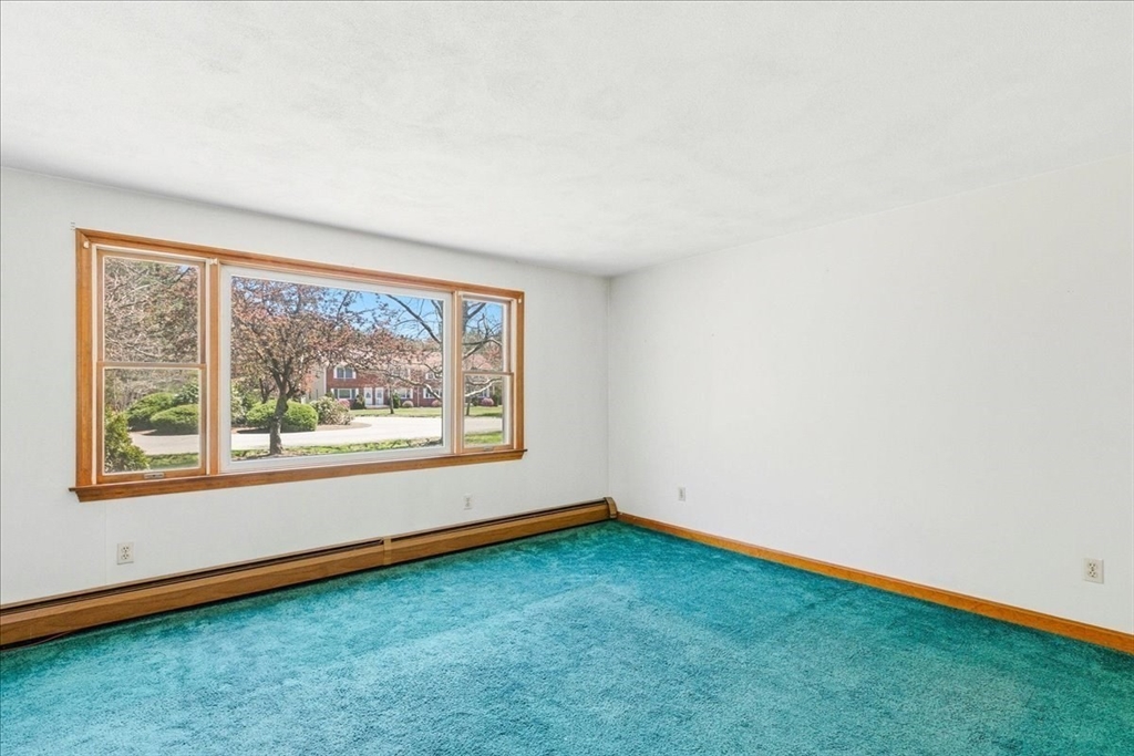 46 Willow Ridge Drive, Unit 46 Bridgewater, MA 02324 - Photo 7 of 40 an empty room with a window