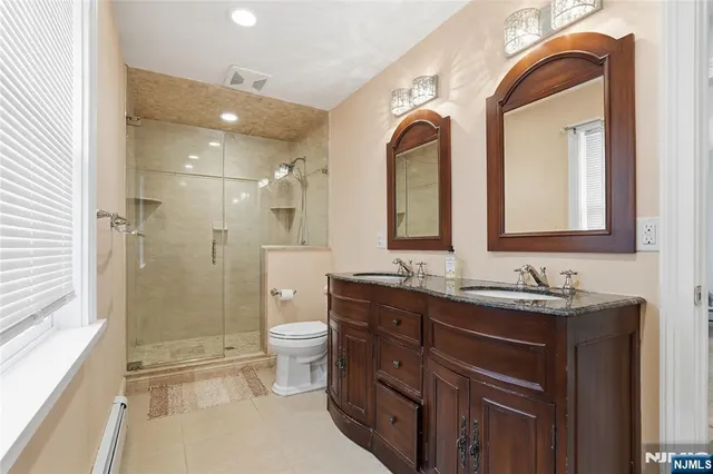 a bed room with a bed and a window