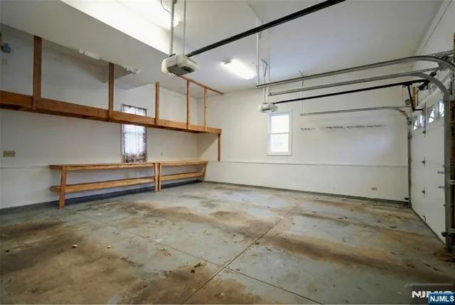 a view of a balcony with furniture and a window
