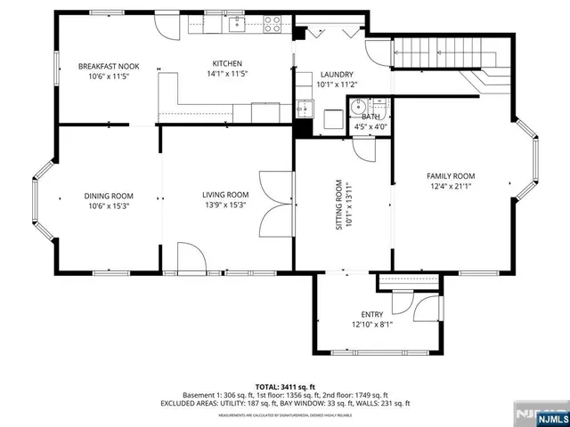 a picture of a bench in front of a gate