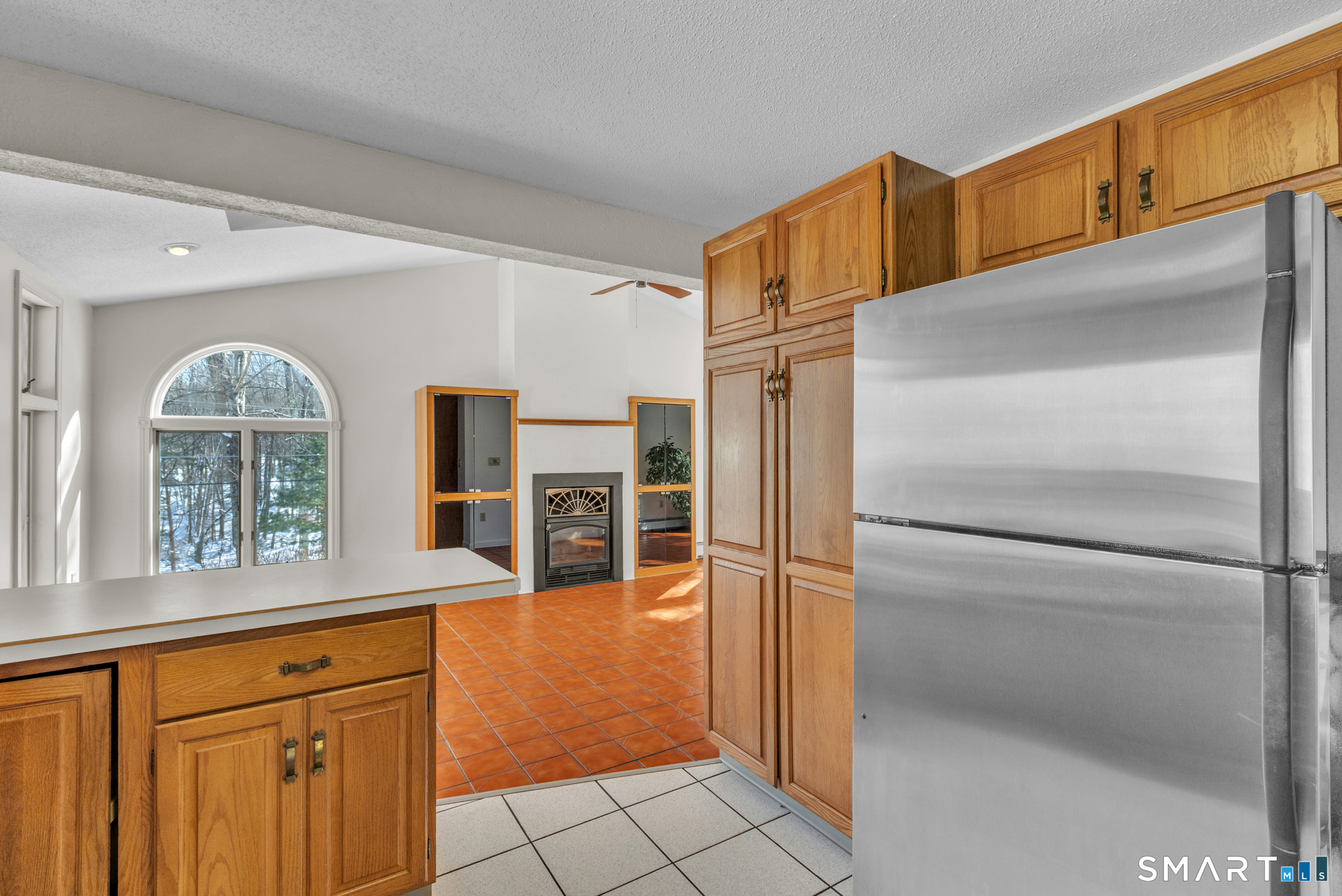 550 High Street Coventry, CT 06238 - Photo 14 of 35 a kitchen with stainless steel appliances granite countertop a refrigerator and a sink