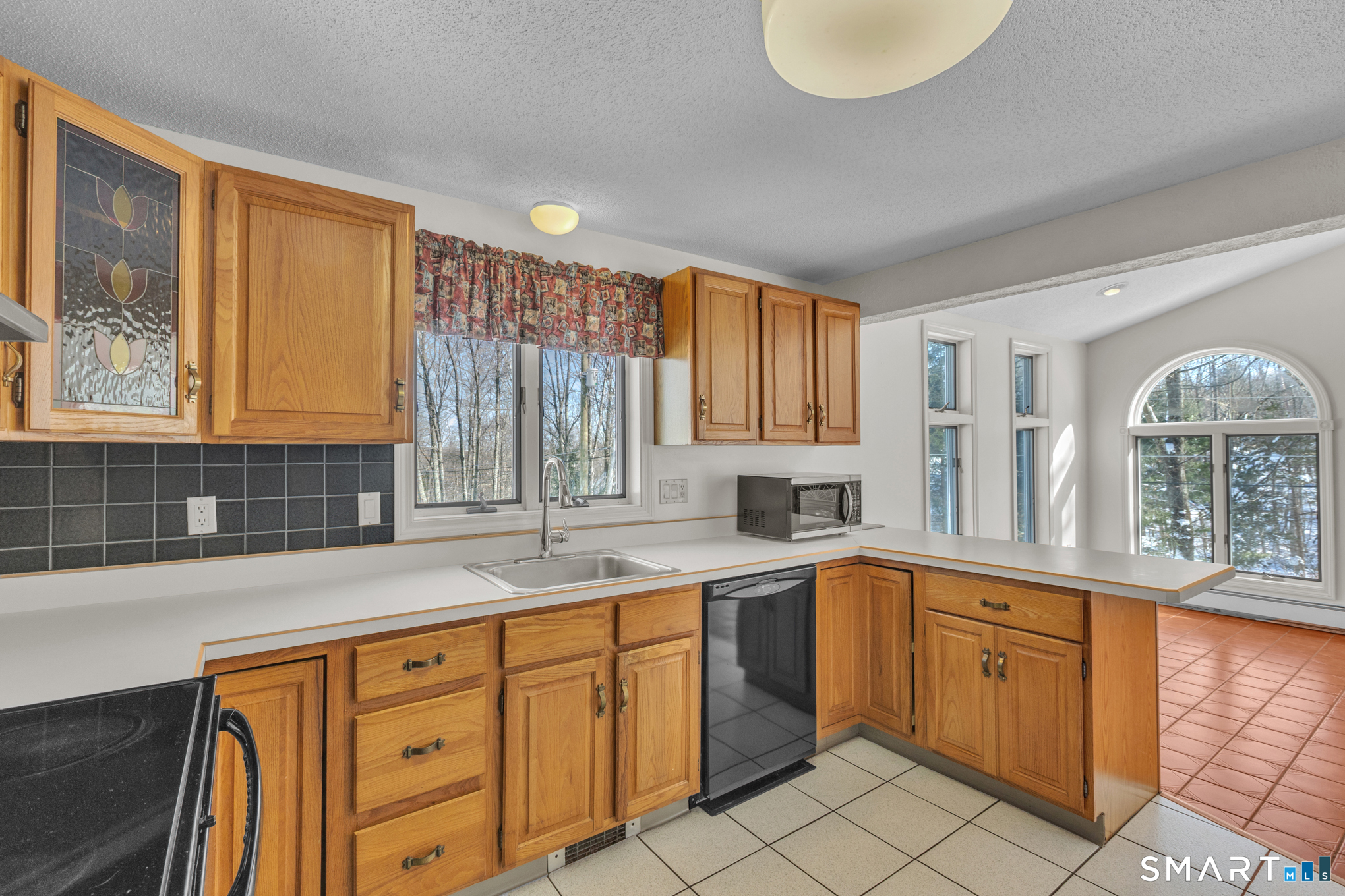 550 High Street Coventry, CT 06238 - Photo 15 of 35 a kitchen with sink cabinets and window
