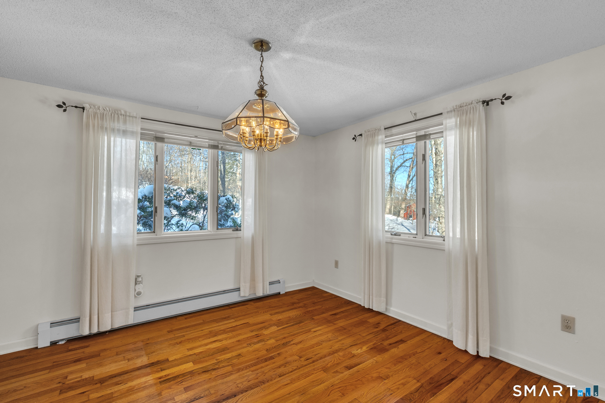 550 High Street Coventry, CT 06238 - Photo 16 of 35 a view of empty room with wooden floor and window
